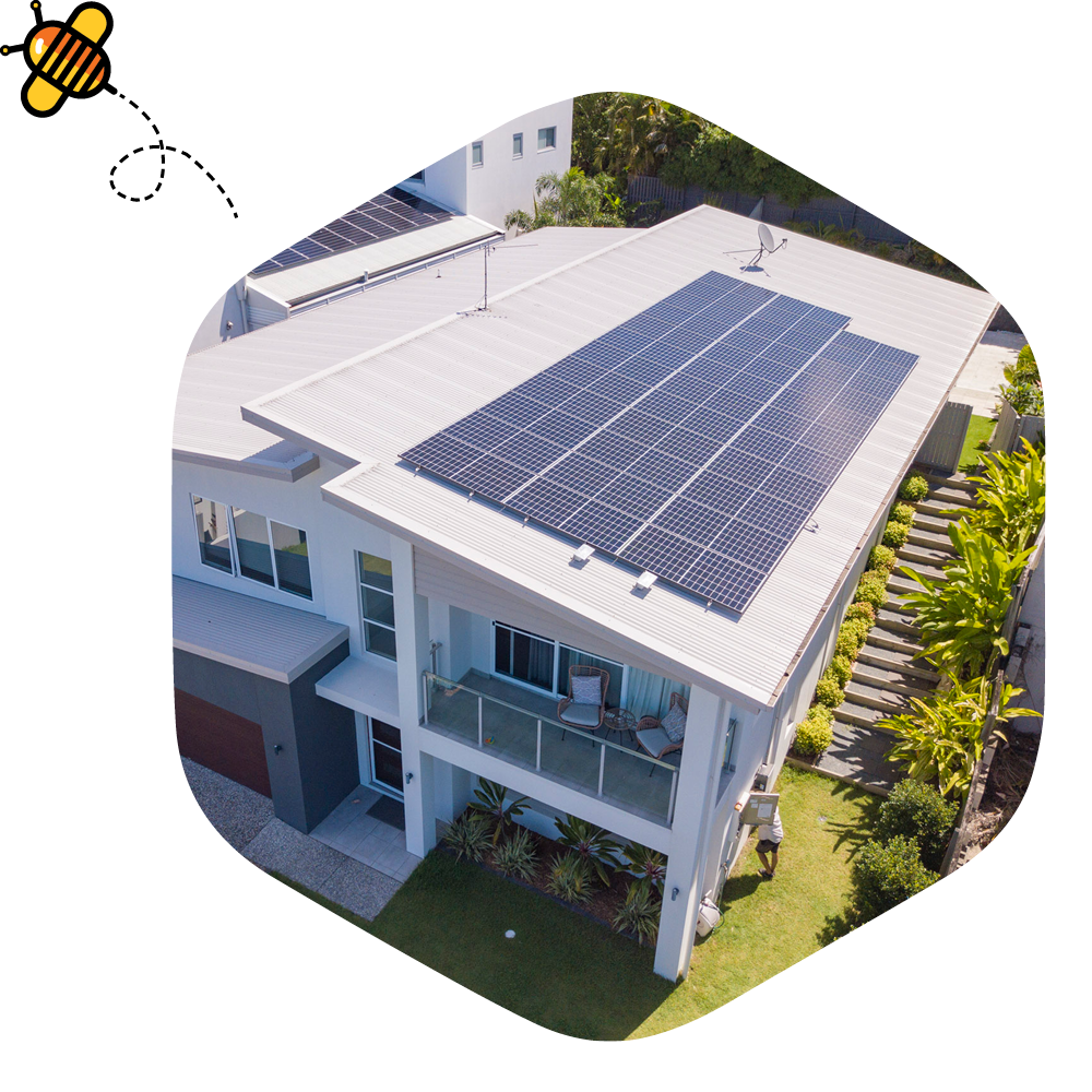 A modern two-story home with a full rooftop solar panel system, installed to maximize energy efficiency and sustainability.